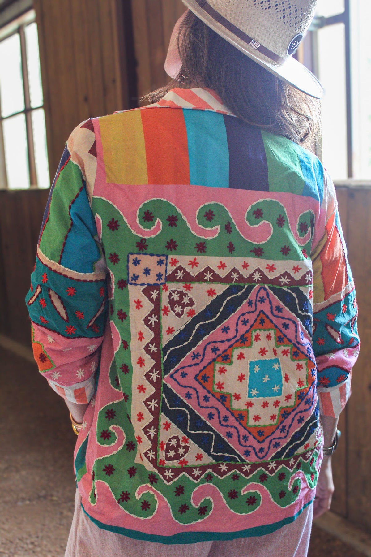 Back of The Tracie Jacket, a women's embroidered cotton patchwork jacket with a hand-stitched medallion and rainbow stripe yoke, by Chap & Graham Designs